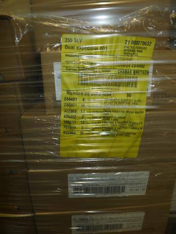 Dépotage et rempotage d'un conteneur contenant des produits laitier à Port Saint Louis dans la société LOGMAT