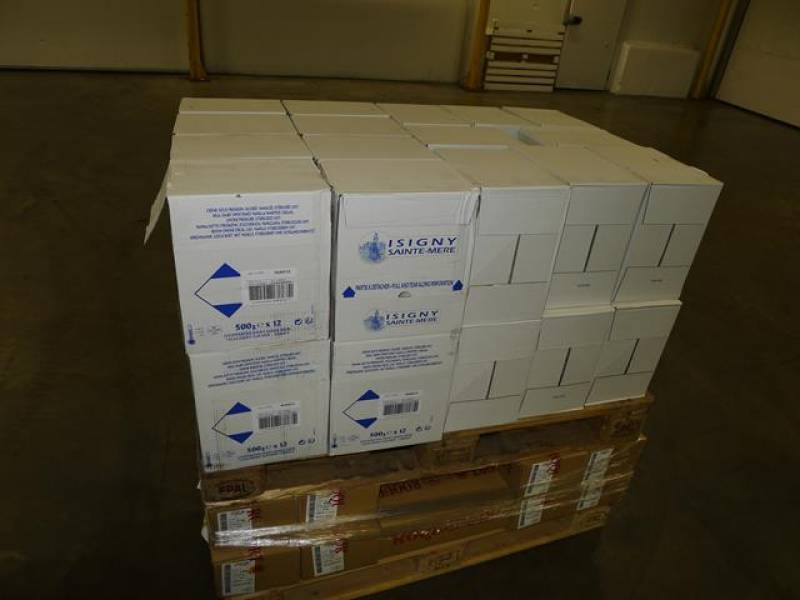 Dépotage et rempotage d'un conteneur contenant des produits laitier à Port Saint Louis dans la société LOGMAT